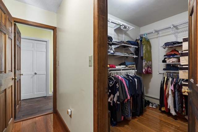 23 Stovers Point Rd, Harpswell, ME 04079 - spacious closet featuring wood finished floors and baseboard heating