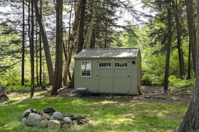 23 Stovers Point Rd, Harpswell, ME 04079 - view of shed featuring a forest view