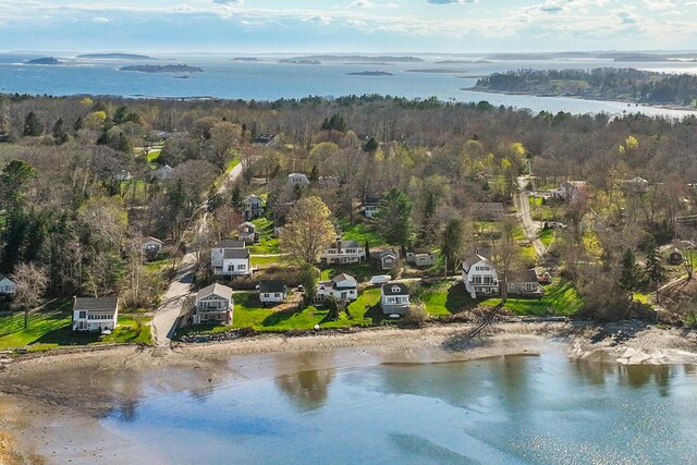 23 Stovers Point Rd, Harpswell, ME 04079 - aerial view of residential area with a heavily wooded area and a nearby body of water