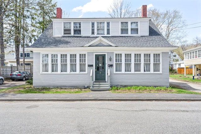 6 Winter St, Augusta, ME 04330 - view of front facade with a chimney, roof with shingles, and entry steps