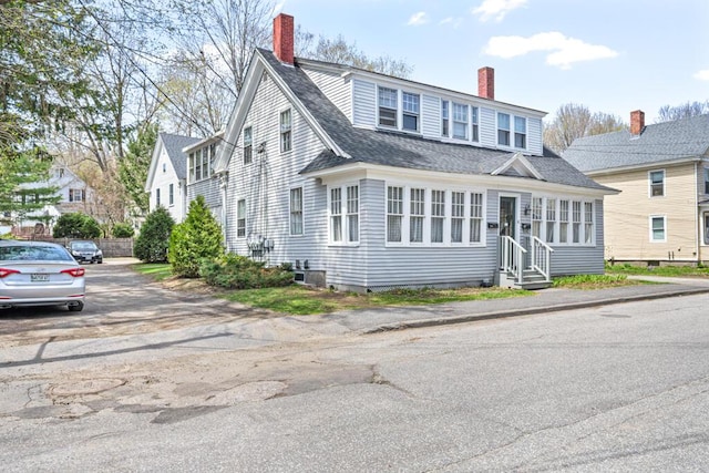 6 Winter St, Augusta, ME 04330 - view of front of house featuring entry steps, a chimney, and a shingled roof