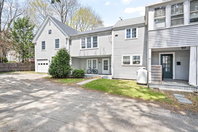 6 Winter St, Augusta, ME 04330 - townhome / multi-family property with a garage and driveway