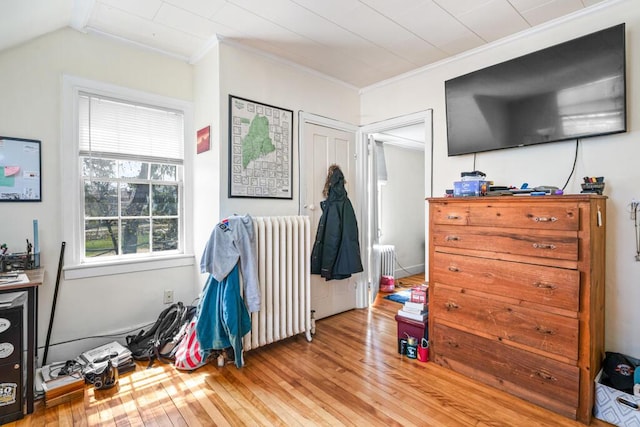 6 Winter St, Augusta, ME 04330 - bedroom with radiator heating unit, hardwood / wood-style floors, crown molding, and lofted ceiling