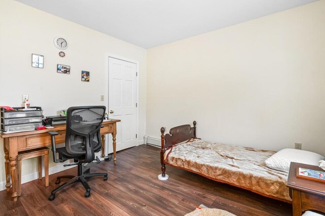 6 Winter St, Augusta, ME 04330 - bedroom with wood finished floors, a desk, baseboards, and baseboard heating