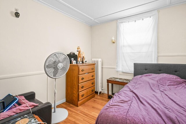 6 Winter St, Augusta, ME 04330 - bedroom featuring wood finished floors, radiator, and baseboards