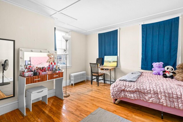 6 Winter St, Augusta, ME 04330 - bedroom featuring radiator, hardwood / wood-style flooring, attic access, and baseboards
