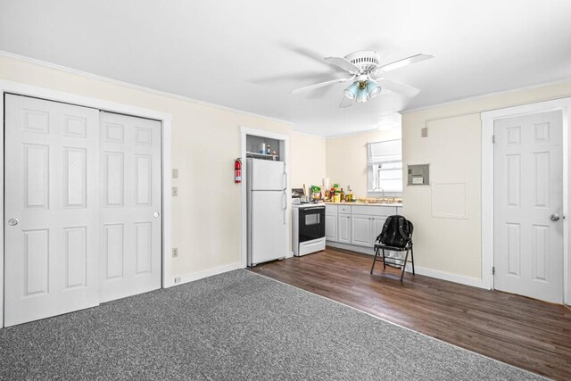 6 Winter St, Augusta, ME 04330 - kitchen with freestanding refrigerator, range with electric cooktop, ornamental molding, baseboards, and a ceiling fan