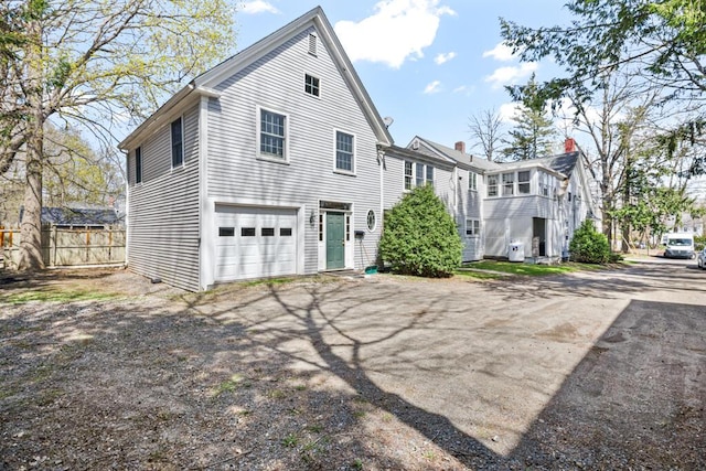 6 Winter St, Augusta, ME 04330 - view of property exterior with driveway and a garage