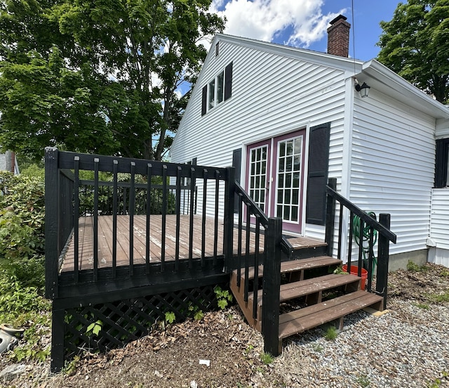 52 Rideout Ave, Lewiston, ME 04240 - rear view of property featuring a chimney and a deck