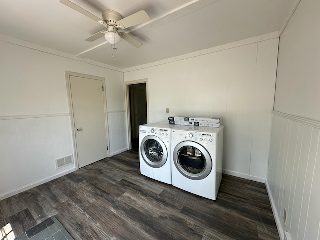52 Rideout Ave, Lewiston, ME 04240 - washroom featuring washer and dryer, dark wood-type flooring, ceiling fan, wainscoting, and a decorative wall
