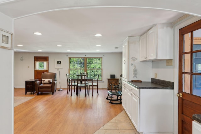592 Old Stage Rd, Arrowsic, ME 04530 - kitchen featuring dark countertops, white cabinetry, recessed lighting, and light wood-style flooring