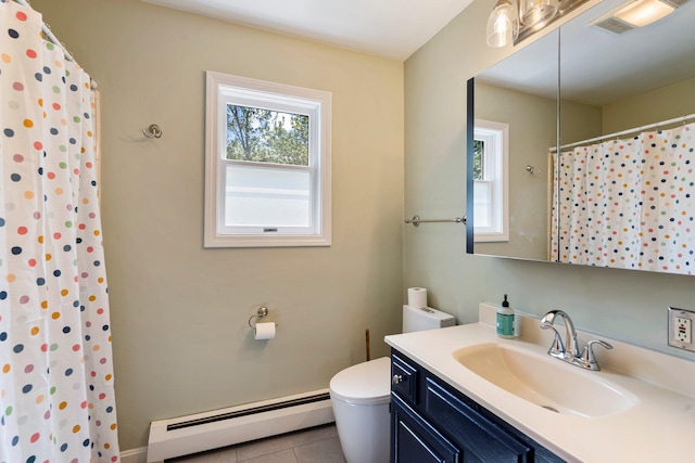 94 Thompson St, South Portland, ME 04106 - bathroom with a baseboard radiator, vanity, toilet, tile patterned floors, and a shower with shower curtain