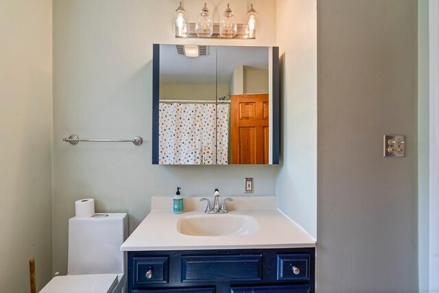 94 Thompson St, South Portland, ME 04106 - full bath with vanity, toilet, and a shower with curtain