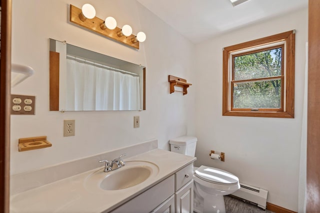 94 Thompson St, South Portland, ME 04106 - full bathroom with a baseboard radiator, toilet, vanity, and a shower with shower curtain