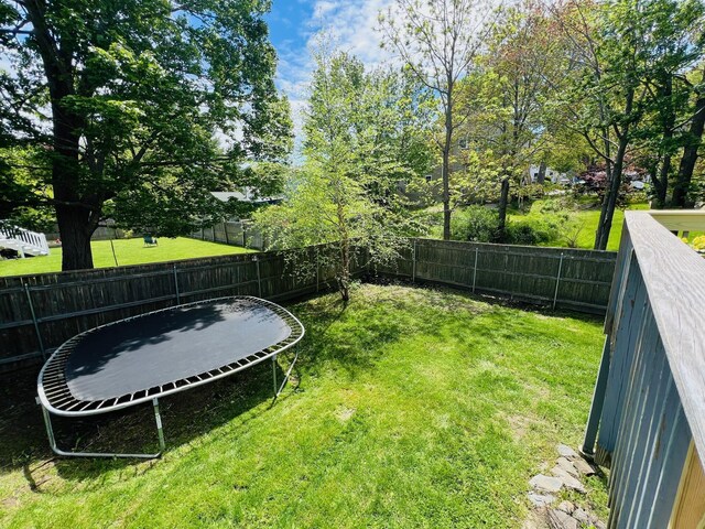94 Thompson St, South Portland, ME 04106 - view of yard featuring a trampoline