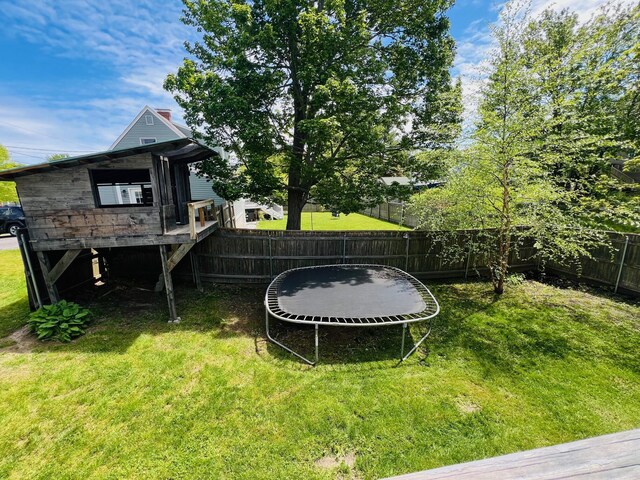 94 Thompson St, South Portland, ME 04106 - view of yard with a trampoline