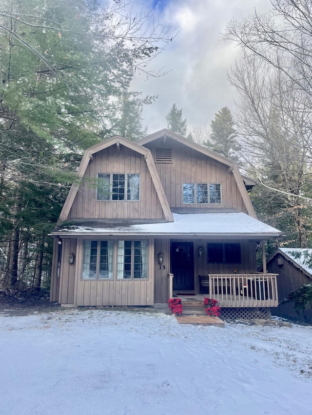 35 Viking Village Rd, Newry, ME 04261 - view of front of property featuring covered porch and board and batten siding