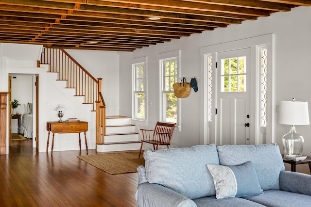286 Atlantic Hwy, Northport, ME 04849 - living room featuring hardwood / wood-style floors, stairway, and beamed ceiling