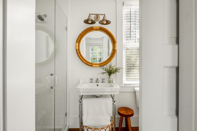 286 Atlantic Hwy, Northport, ME 04849 - full bathroom featuring a stall shower, toilet, and a sink