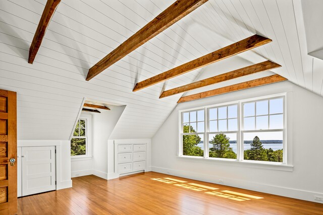 286 Atlantic Hwy, Northport, ME 04849 - additional living space with plenty of natural light, light wood finished floors, baseboards, and a water view
