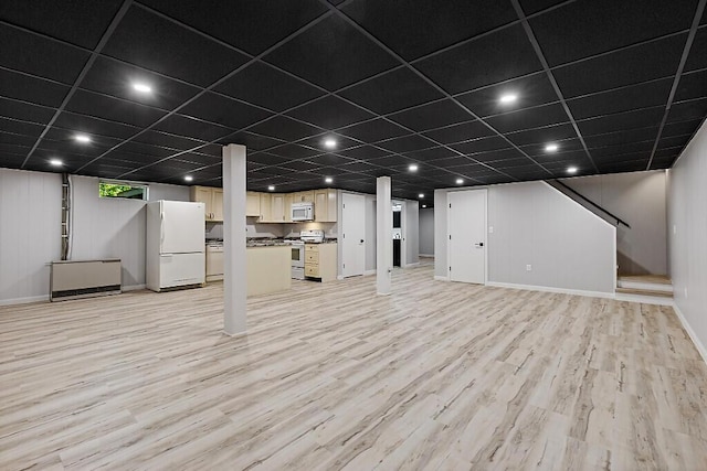 7 Philip Ave, Augusta, ME 04330 - basement featuring freestanding refrigerator, light wood-style floors, baseboards, stairway, and recessed lighting
