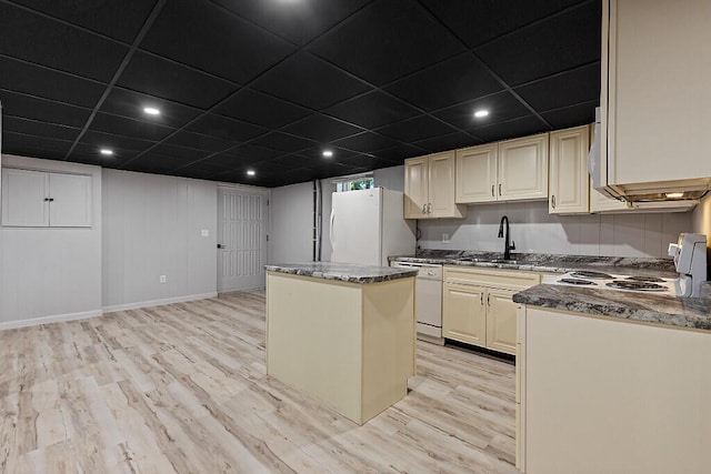7 Philip Ave, Augusta, ME 04330 - kitchen with a sink, white appliances, a center island, light wood-style flooring, and a paneled ceiling