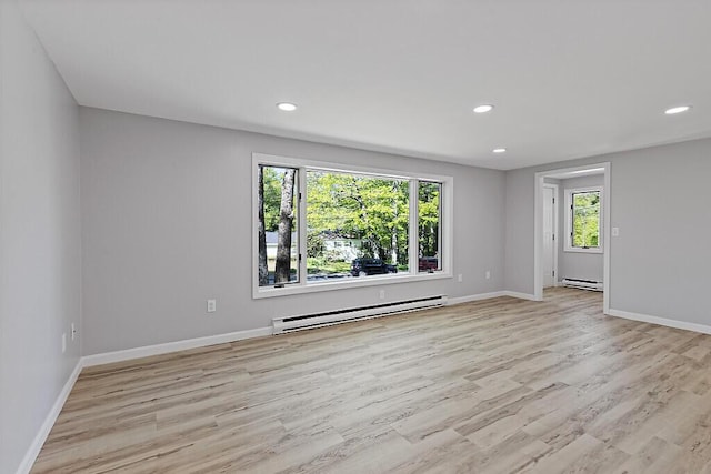 7 Philip Ave, Augusta, ME 04330 - spare room featuring a baseboard radiator, light wood-style floors, recessed lighting, and baseboards