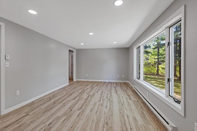 7 Philip Ave, Augusta, ME 04330 - unfurnished room with a baseboard radiator, plenty of natural light, light wood-style floors, recessed lighting, and baseboards