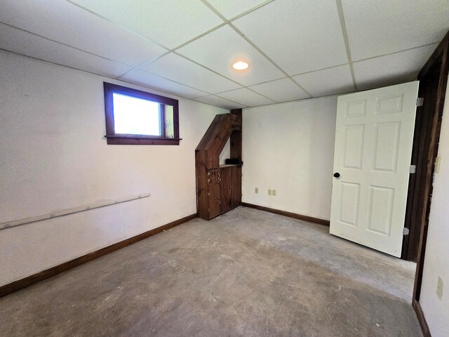 237 Bangor Rd, Unity, ME 04988 - below grade area featuring a drop ceiling and baseboards