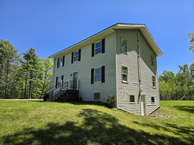237 Bangor Rd, Unity, ME 04988 - view of side of property featuring a lawn