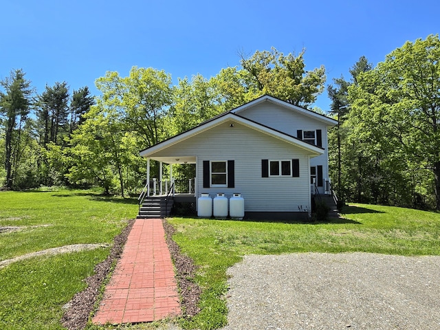 237 Bangor Rd, Unity, ME 04988 - view of front of home featuring a front yard and covered porch