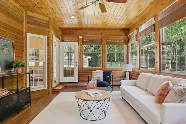 10 Ledge Hill Rd, Gorham, ME 04038 - sunroom / solarium featuring ceiling fan, an outdoor hangout area, hardwood / wood-style floors, a baseboard heating unit, and wood ceiling