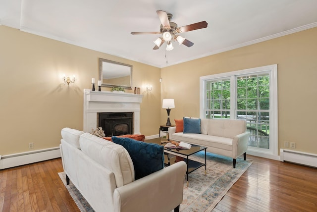 10 Ledge Hill Rd, Gorham, ME 04038 - living area featuring a baseboard radiator, ceiling fan, a baseboard heating unit, hardwood / wood-style flooring, and ornamental molding