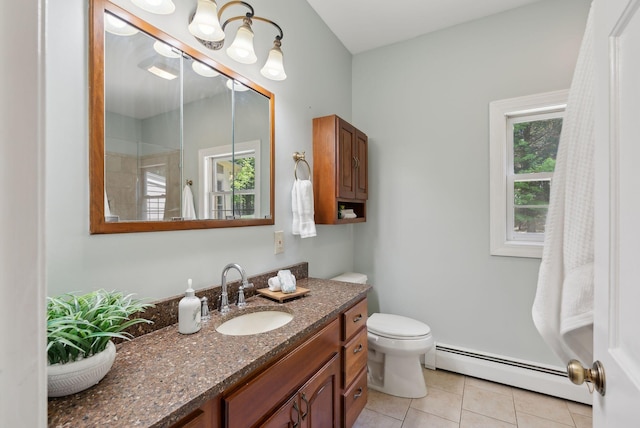10 Ledge Hill Rd, Gorham, ME 04038 - full bathroom featuring baseboard heating, vanity, tile patterned floors, toilet, and a shower