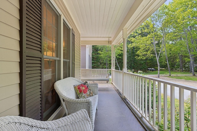 10 Ledge Hill Rd, Gorham, ME 04038 - covered porch featuring view of scattered trees