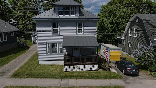 55 Poplar St, Bangor, ME 04401 - view of front facade with a standing seam roof, metal roof, and a front lawn