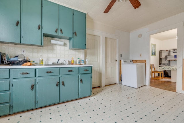 74 King Ave, Lewiston, ME 04240 - kitchen featuring light floors, a ceiling fan, tasteful backsplash, light countertops, and ornamental molding