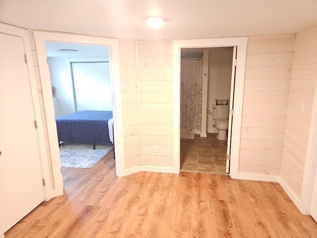 262 Golf Course Rd, Newport, ME 04953 - bedroom featuring light wood-style flooring and ensuite bathroom