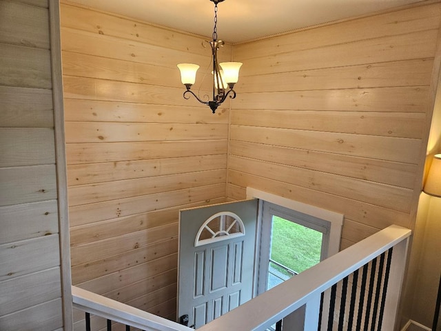 262 Golf Course Rd, Newport, ME 04953 - stairway featuring a chandelier and wooden walls