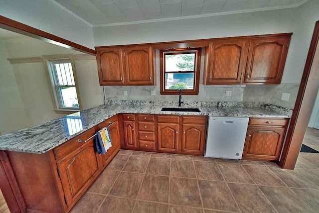 6 Pleasant Ct, Houlton, ME 04730 - kitchen featuring dishwashing machine, a sink, crown molding, a peninsula, and brown cabinets