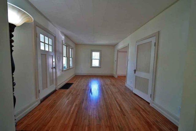 6 Pleasant Ct, Houlton, ME 04730 - empty room featuring hardwood / wood-style floors and baseboards