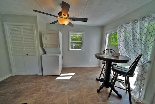6 Pleasant Ct, Houlton, ME 04730 - dining area featuring stacked washer / dryer, baseboards, tile patterned floors, and a ceiling fan