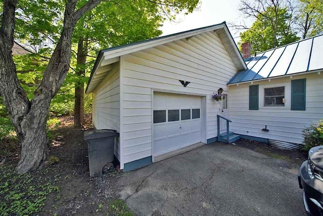 6 Pleasant Ct, Houlton, ME 04730 - detached garage featuring driveway