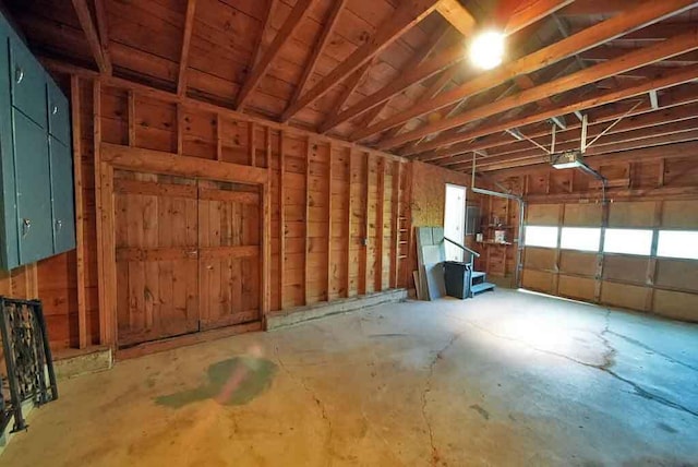 6 Pleasant Ct, Houlton, ME 04730 - garage featuring a garage door opener