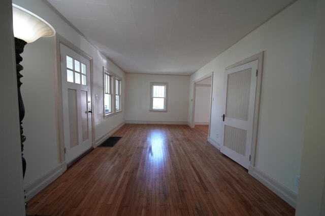 6 Pleasant Ct, Houlton, ME 04730 - spare room featuring wood finished floors and baseboards