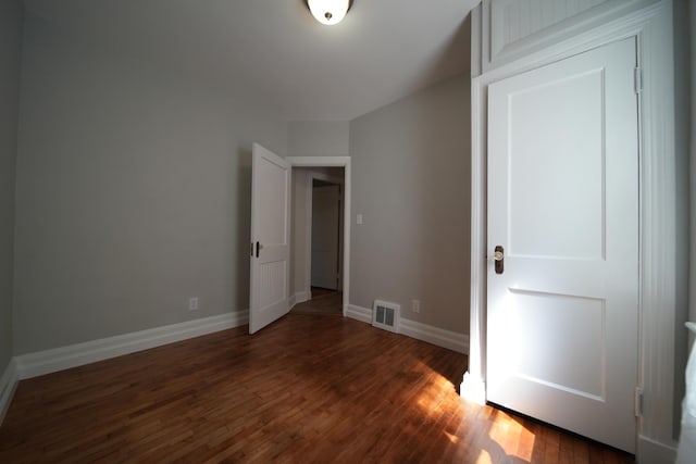 6 Pleasant Ct, Houlton, ME 04730 - unfurnished bedroom featuring wood finished floors and baseboards