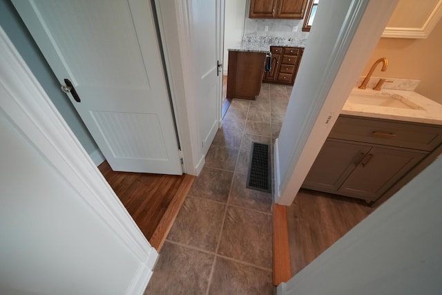 6 Pleasant Ct, Houlton, ME 04730 - bathroom featuring vanity and tile patterned flooring