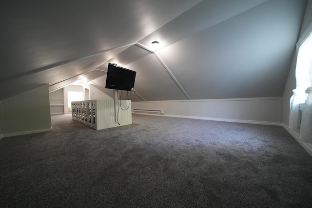 6 Pleasant Ct, Houlton, ME 04730 - bonus room featuring a baseboard radiator, lofted ceiling, and dark carpet