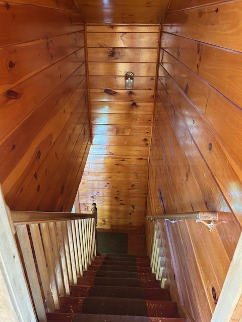 20 Monument Rd, Abbot, ME 04406 - stairs featuring wooden walls