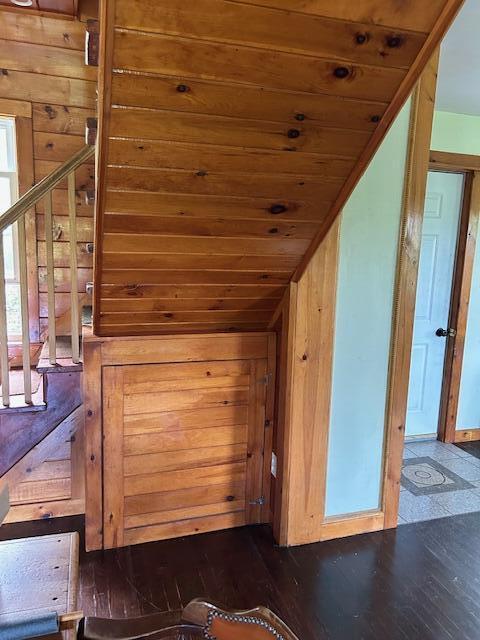 20 Monument Rd, Abbot, ME 04406 - additional living space with wooden ceiling, vaulted ceiling, wood finished floors, stairway, and wooden walls